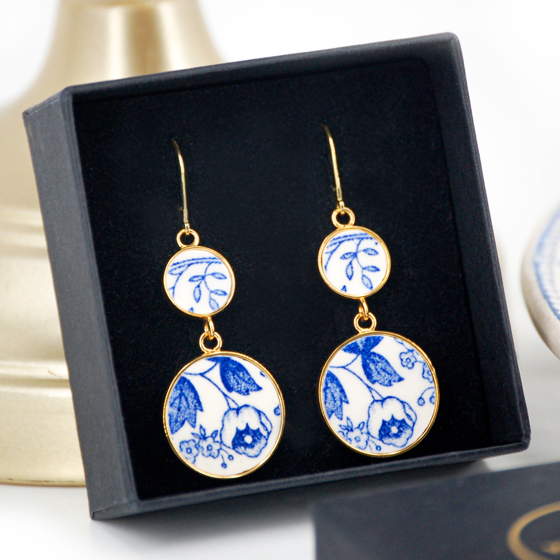 "Leaves and Flowers in the Wind" earrings, gold finish