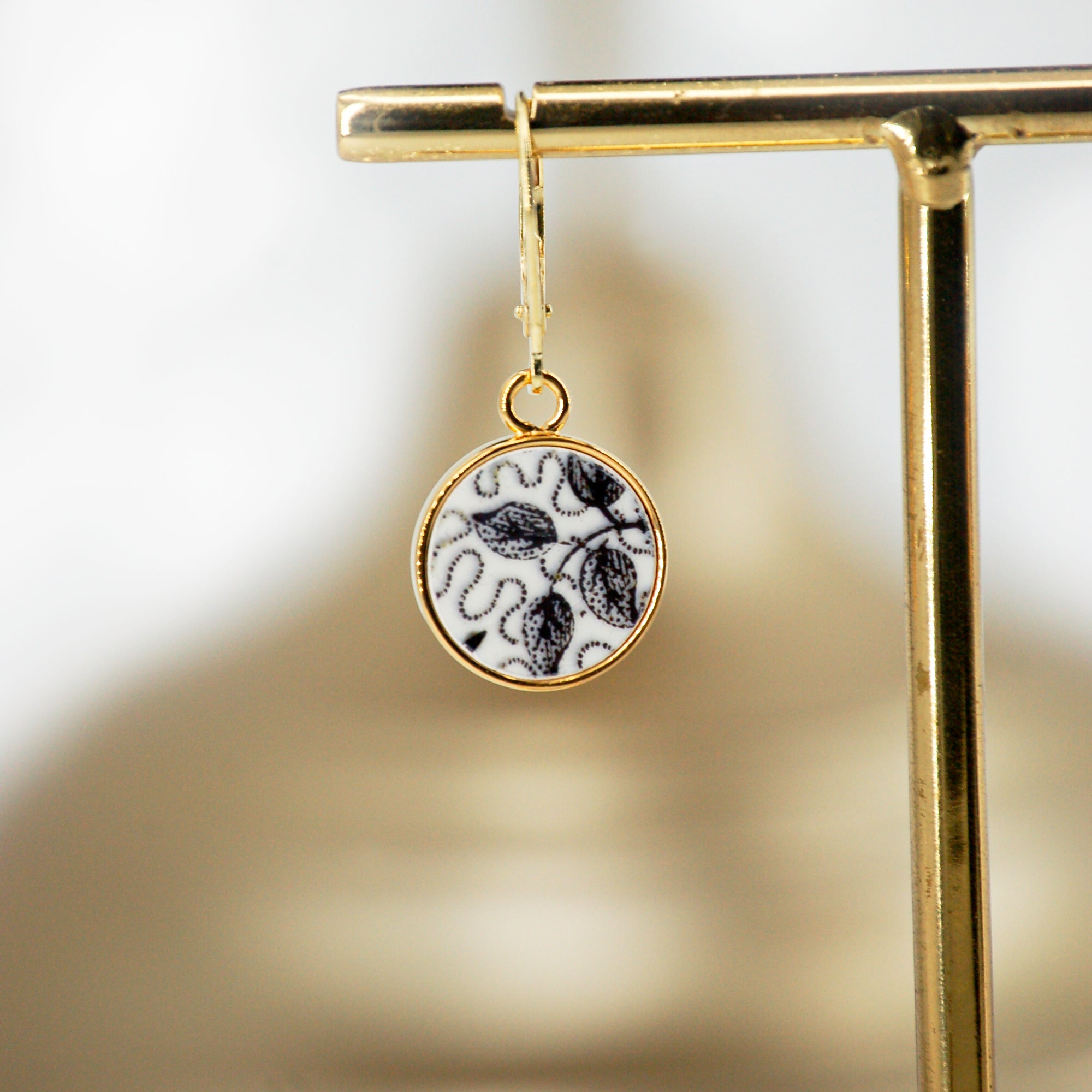Earrings "Composition between realism and abstraction", gold finish