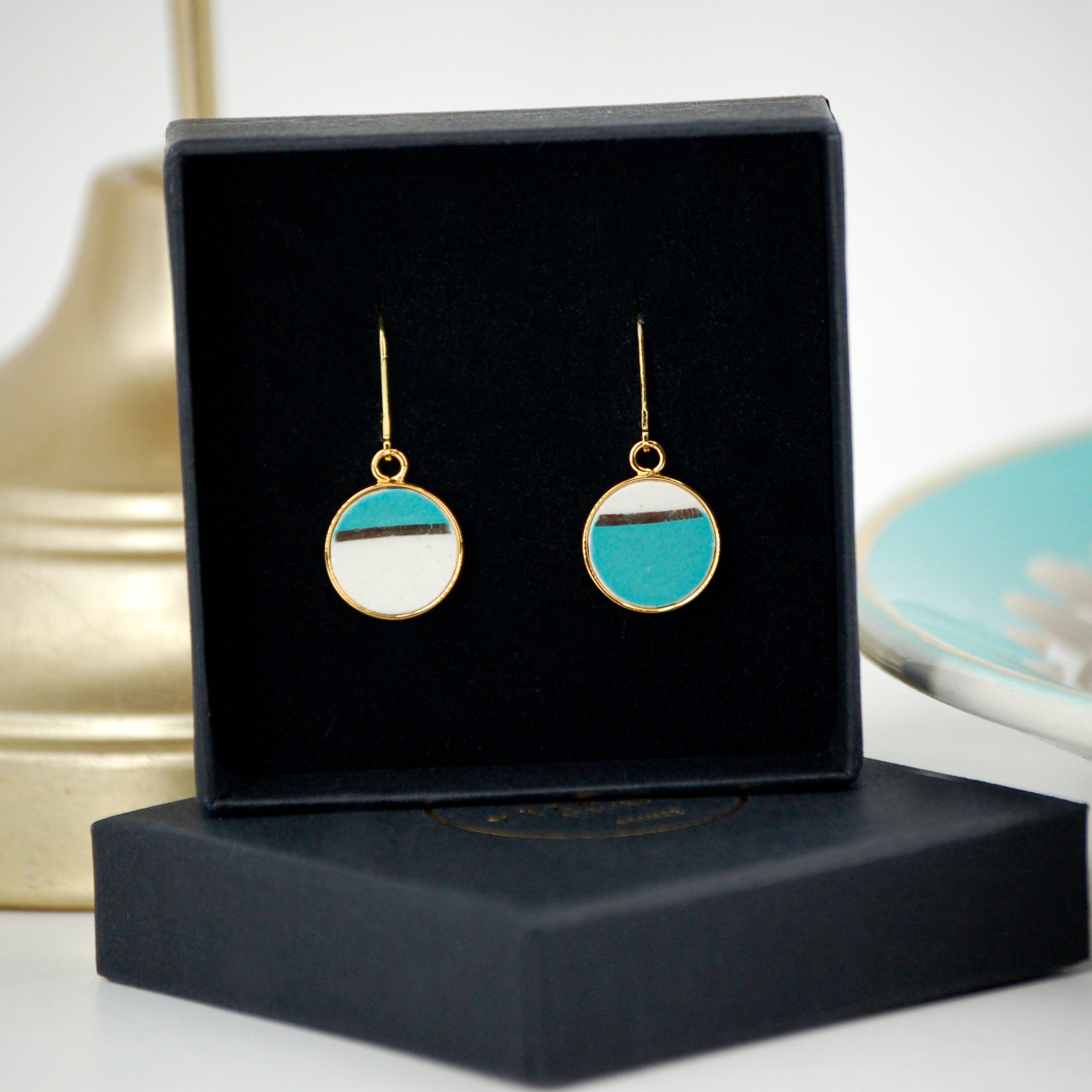 "Asymmetrical Horizon" earrings, gold finish