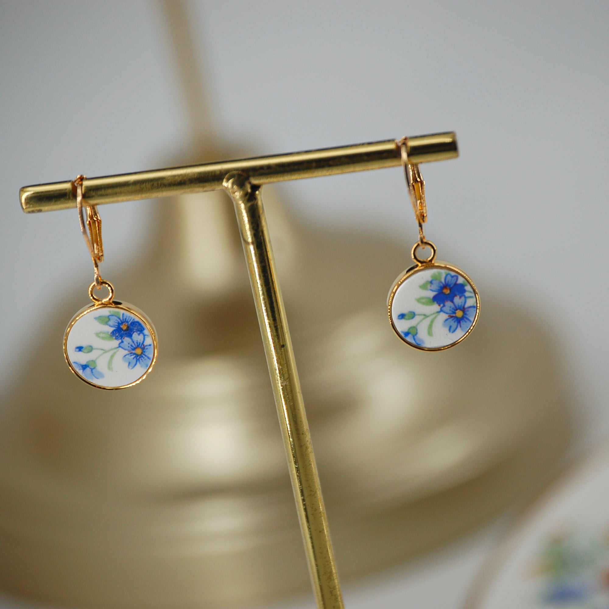 "Small blue flowers" earrings, gold finish
