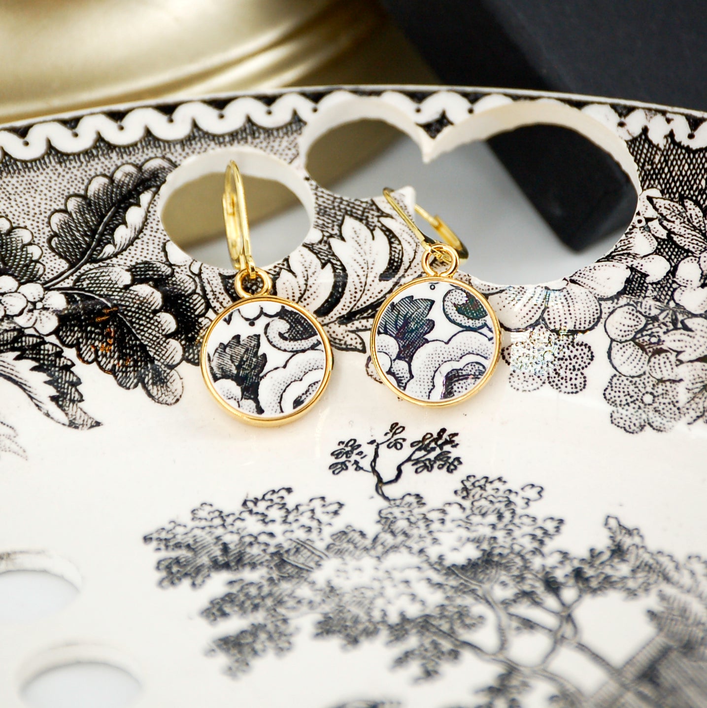 "19th Century Composition" earrings, gold finish