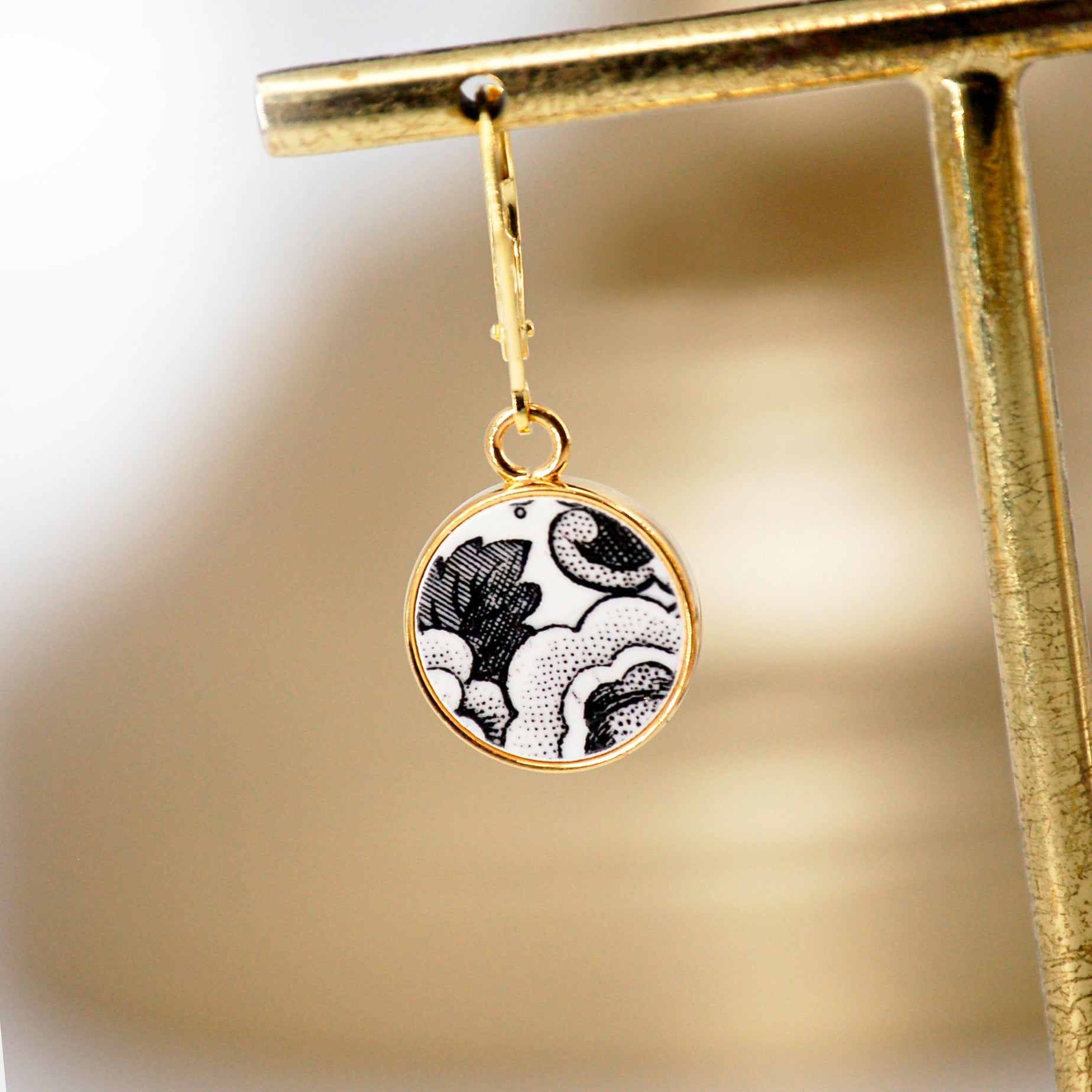 "19th Century Composition" earrings, gold finish