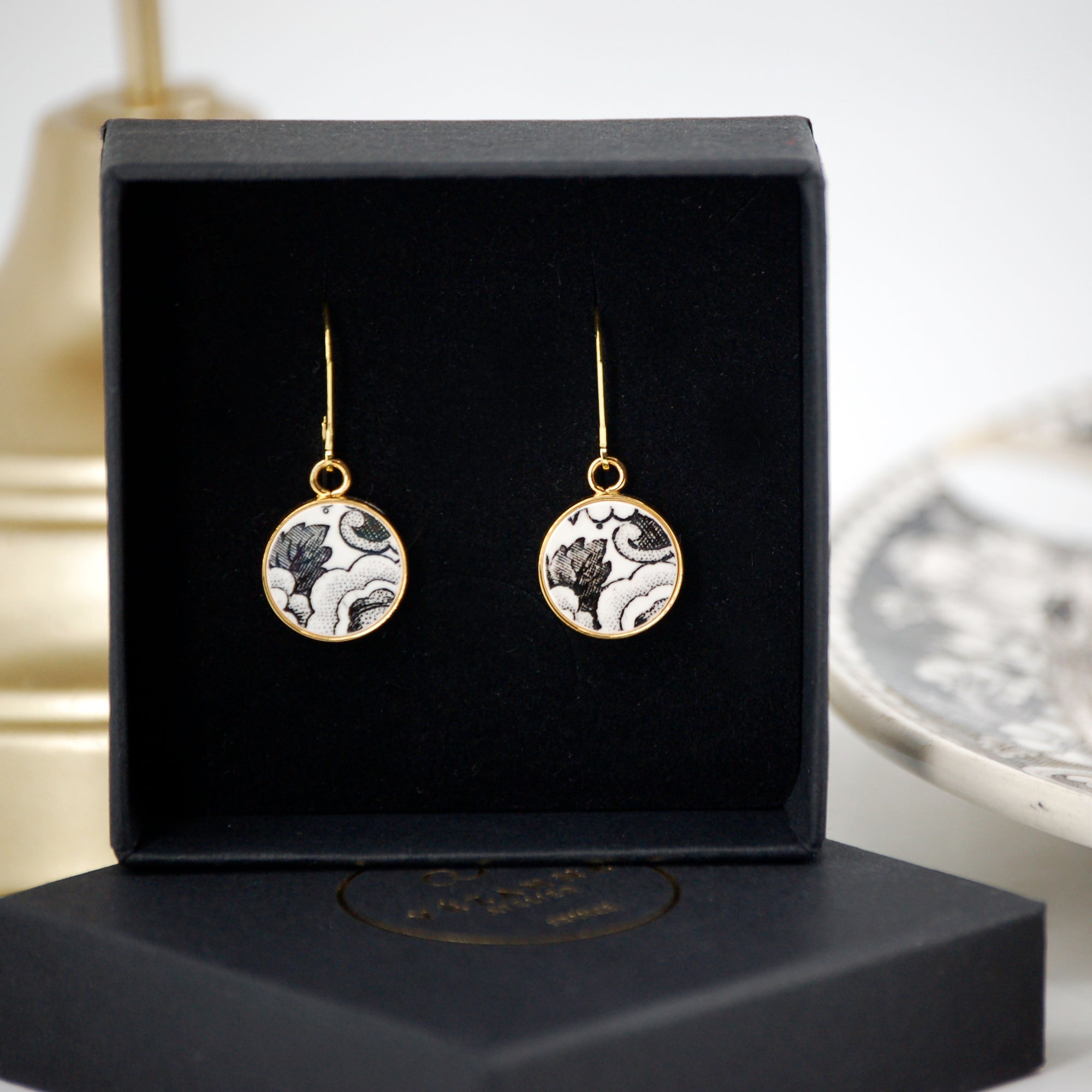 "19th Century Composition" earrings, gold finish
