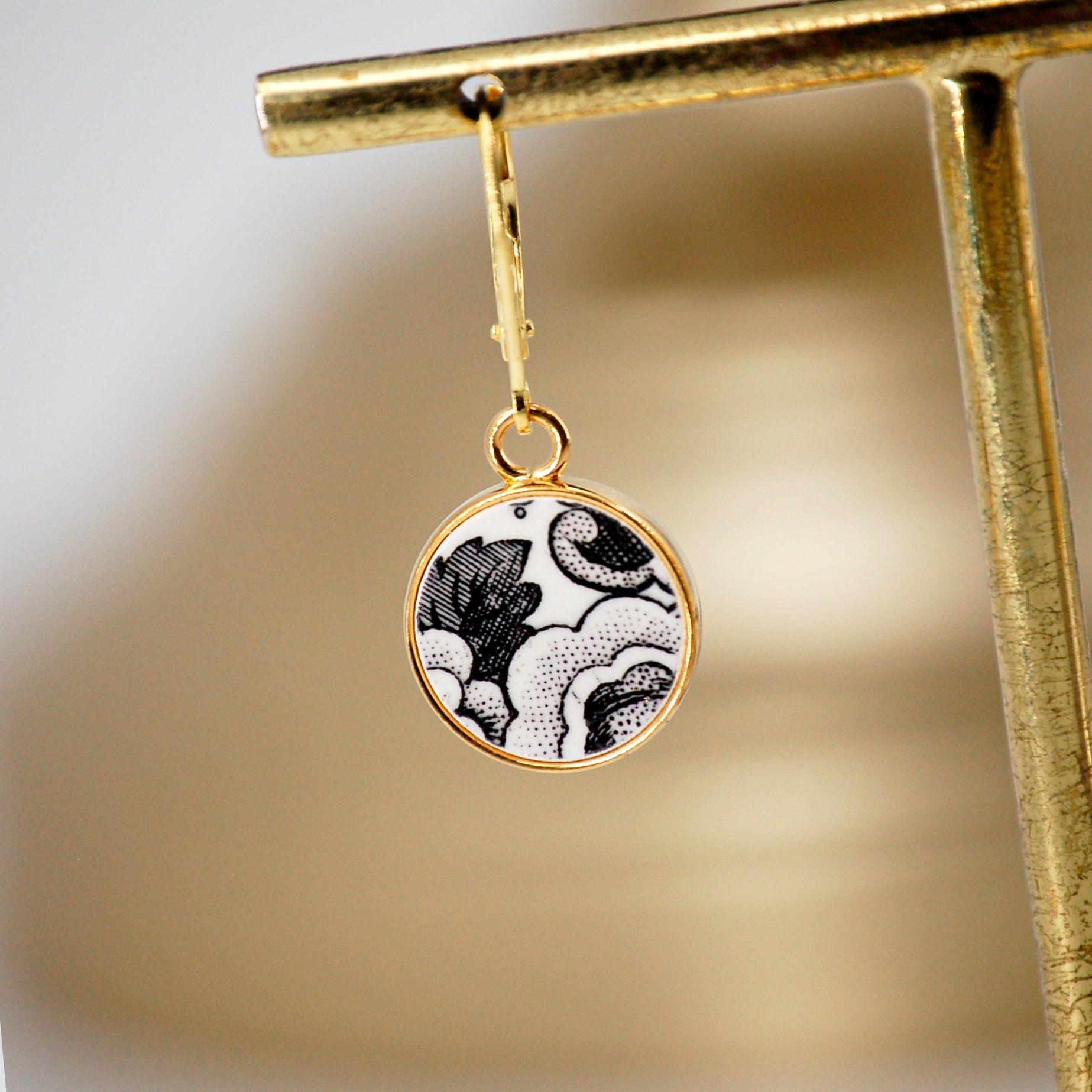 "19th Century Composition" earrings, gold finish