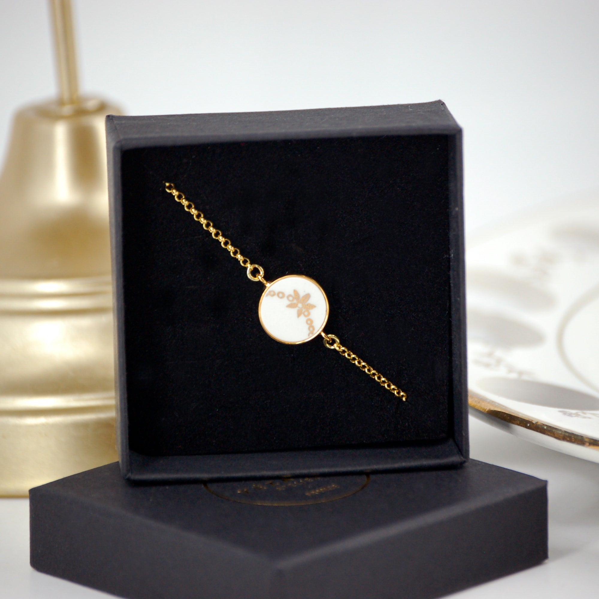 Adjustable bracelet "Small golden flower on chain", gold finish