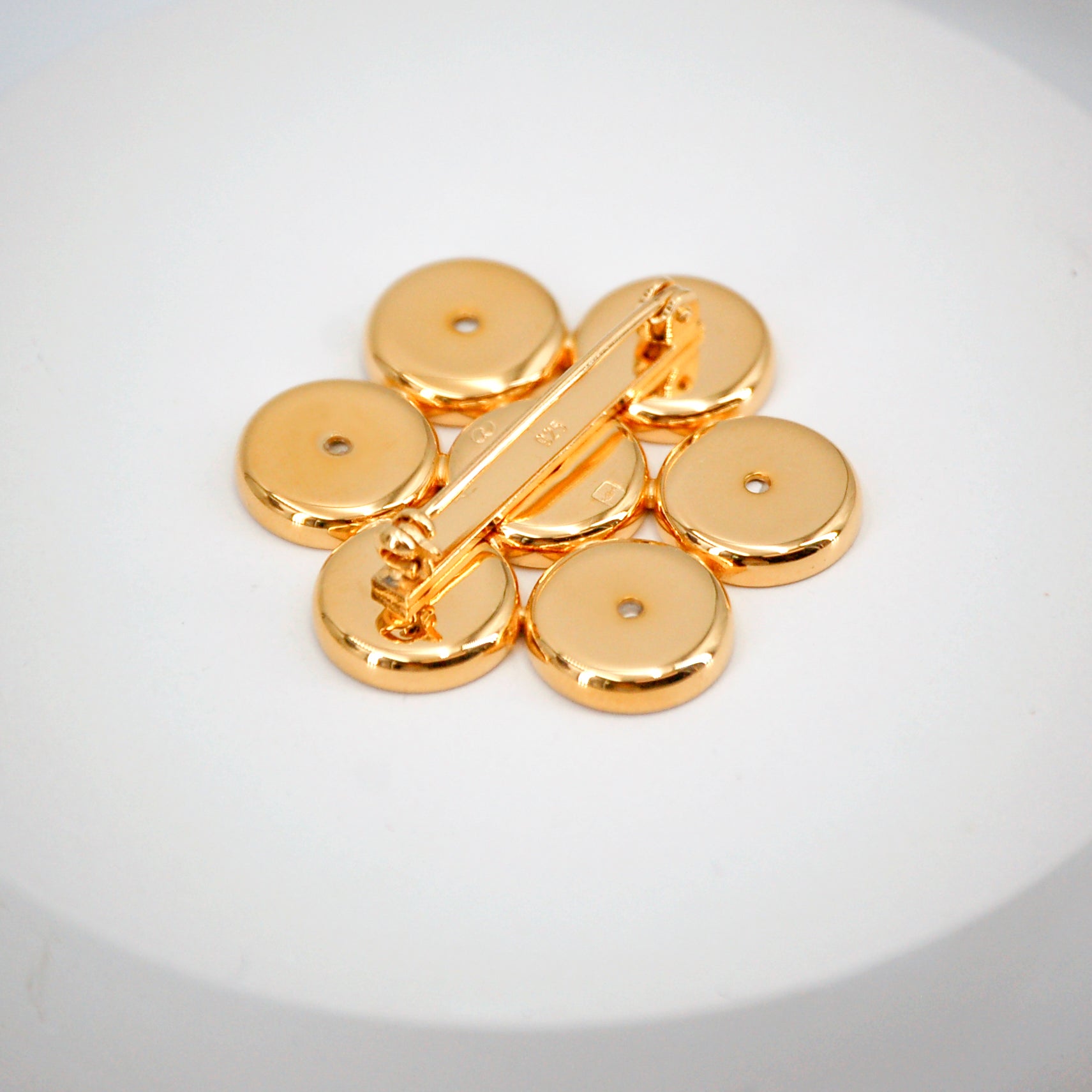 "The Declaration" brooch, gold finish
