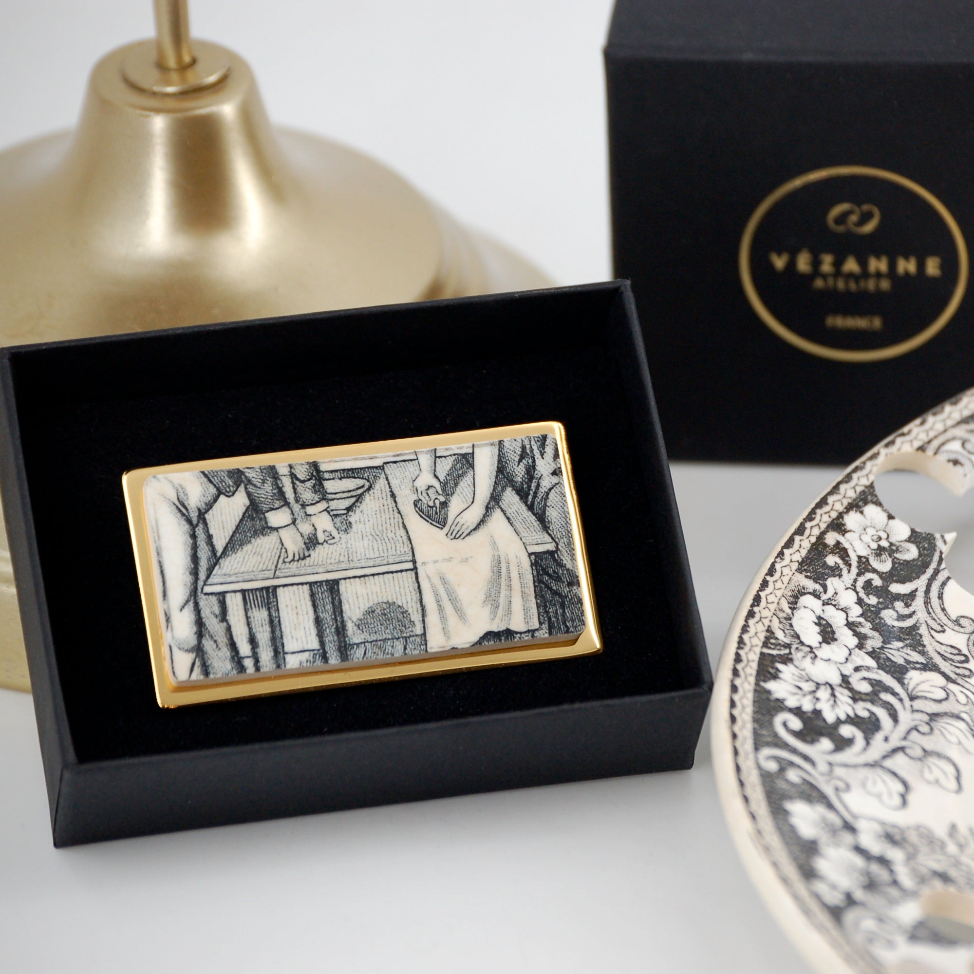 "The Declaration" brooch, gold finish