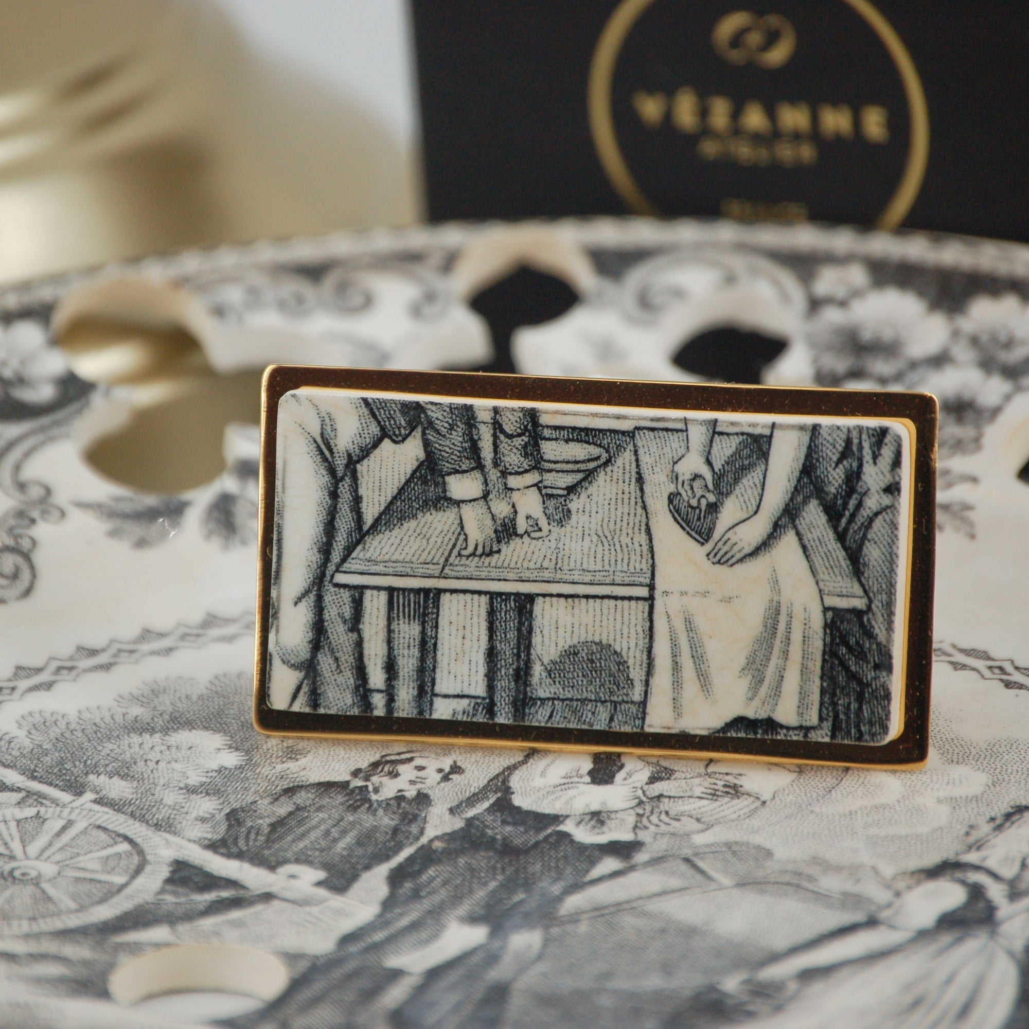 "The Declaration" brooch, gold finish