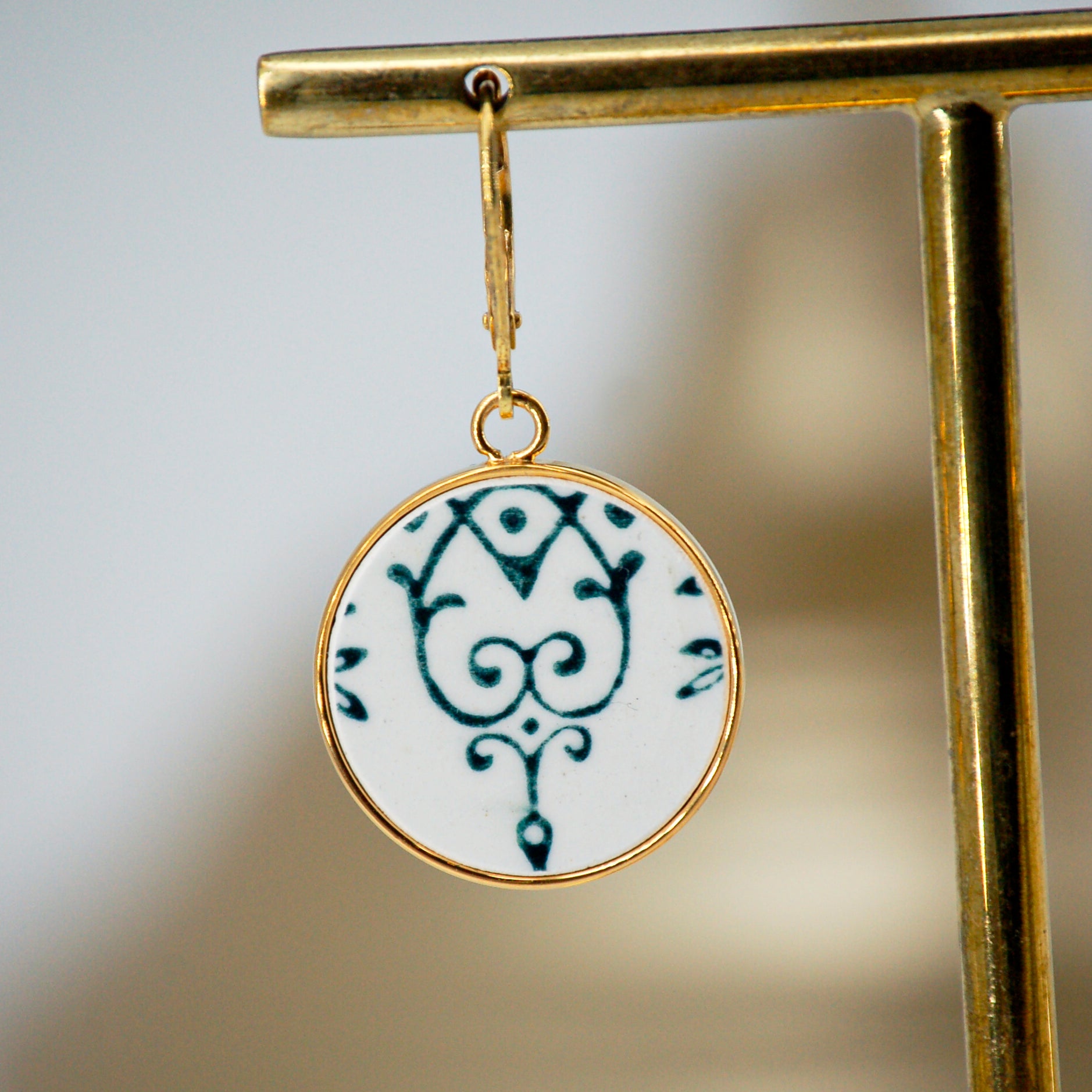 Boucles d'oreilles "Volutes vertes", finition or