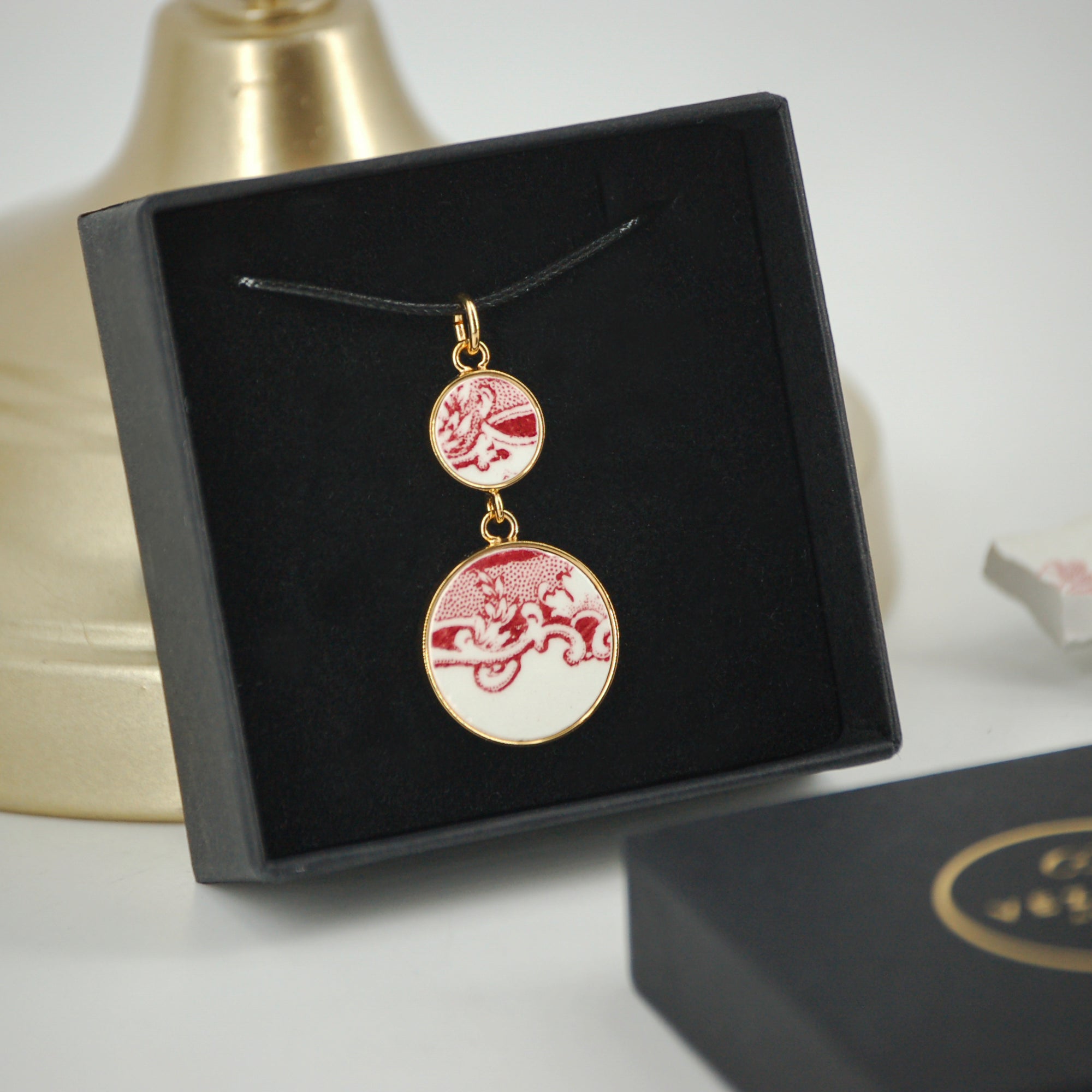 "Swirls in old rose" pendant, gold finish