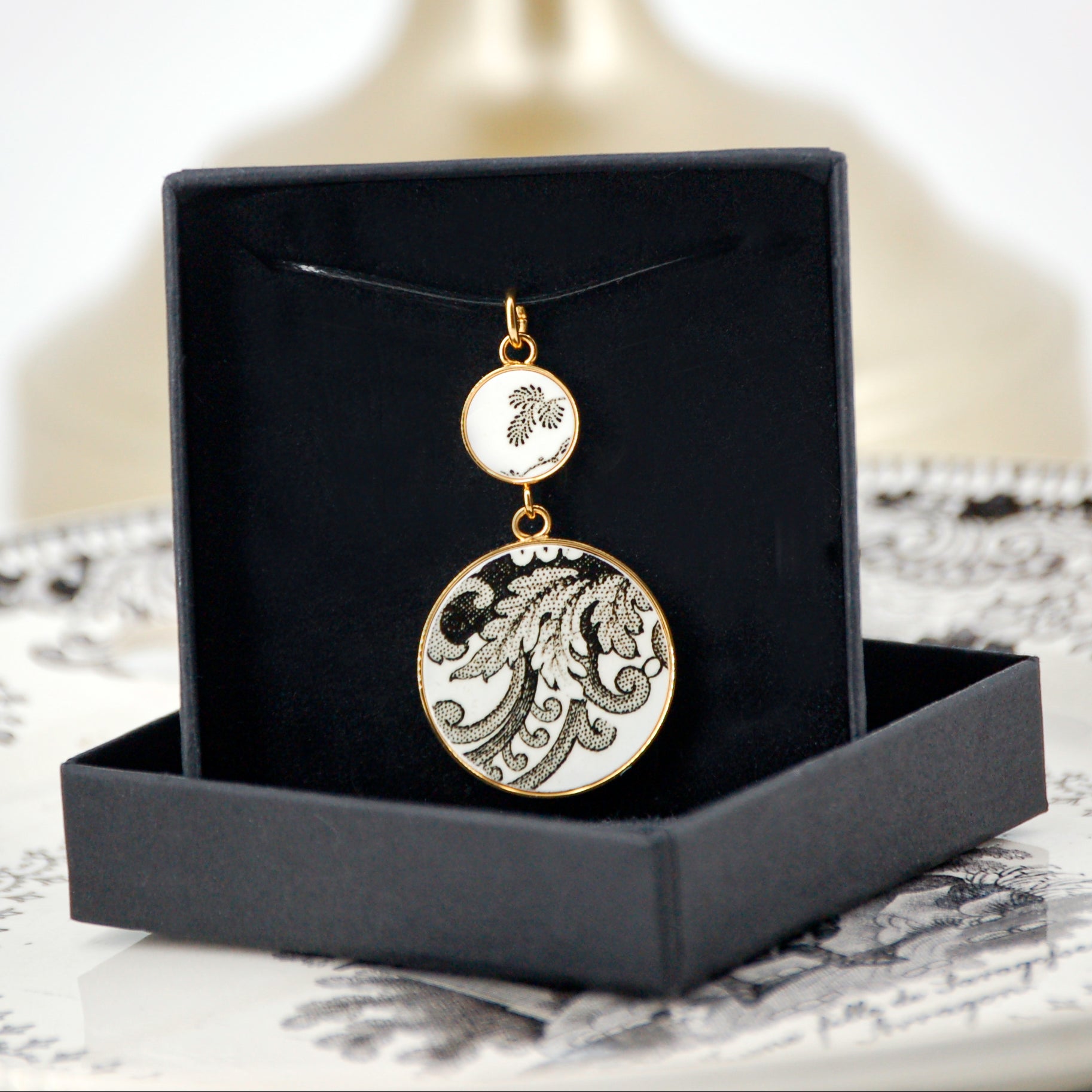 Pendant "Black and white floral composition", silver finish