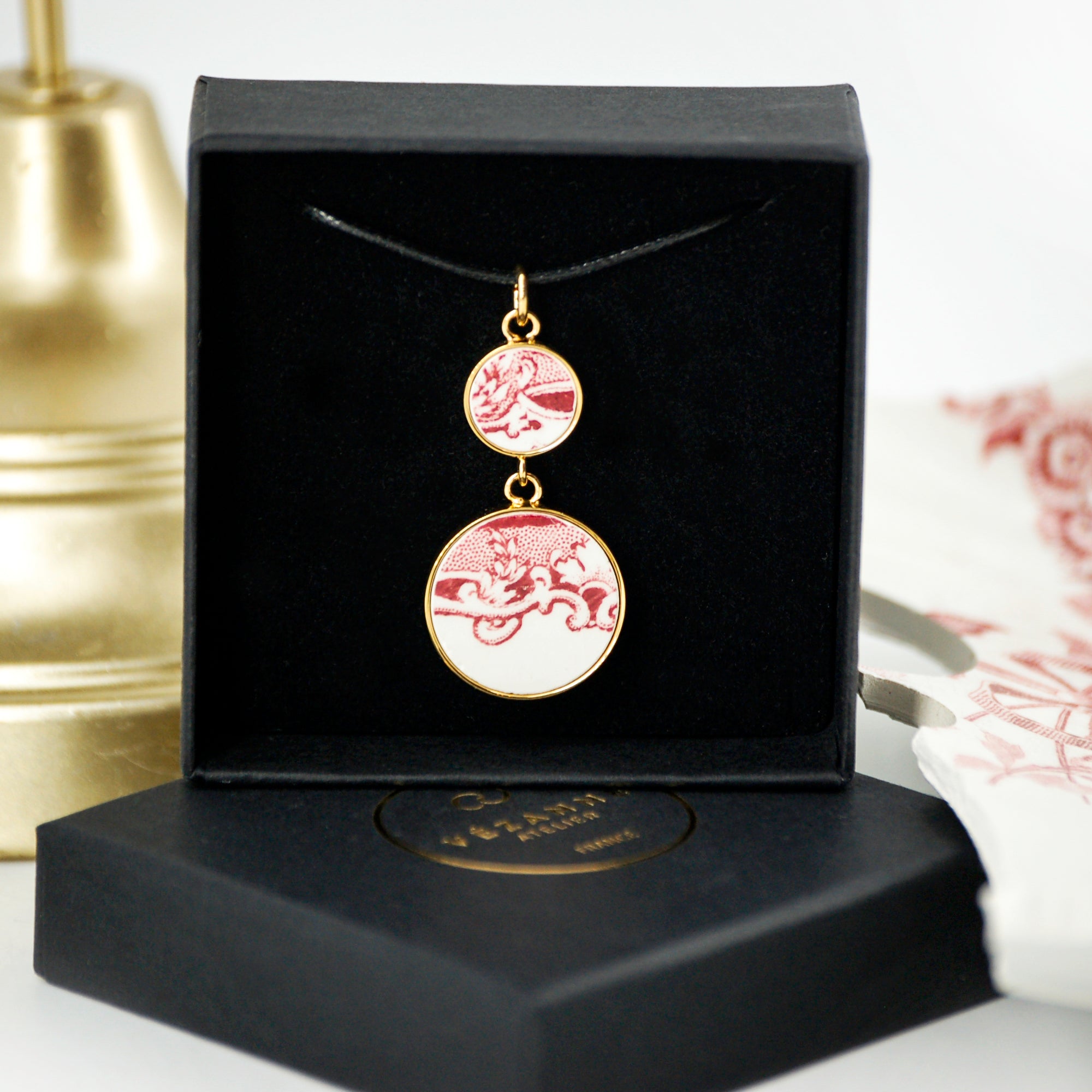"Swirls in old rose" pendant, gold finish