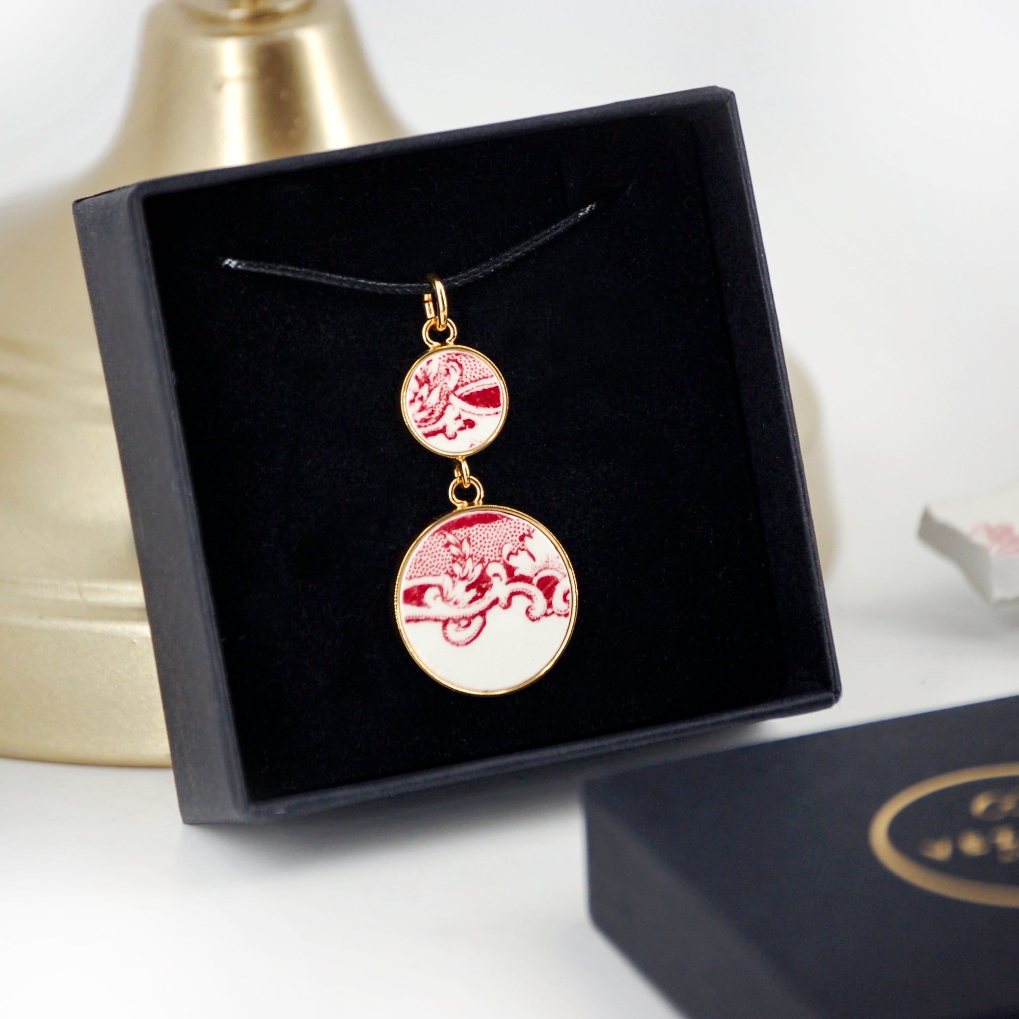 "Swirls in old rose" pendant, gold finish