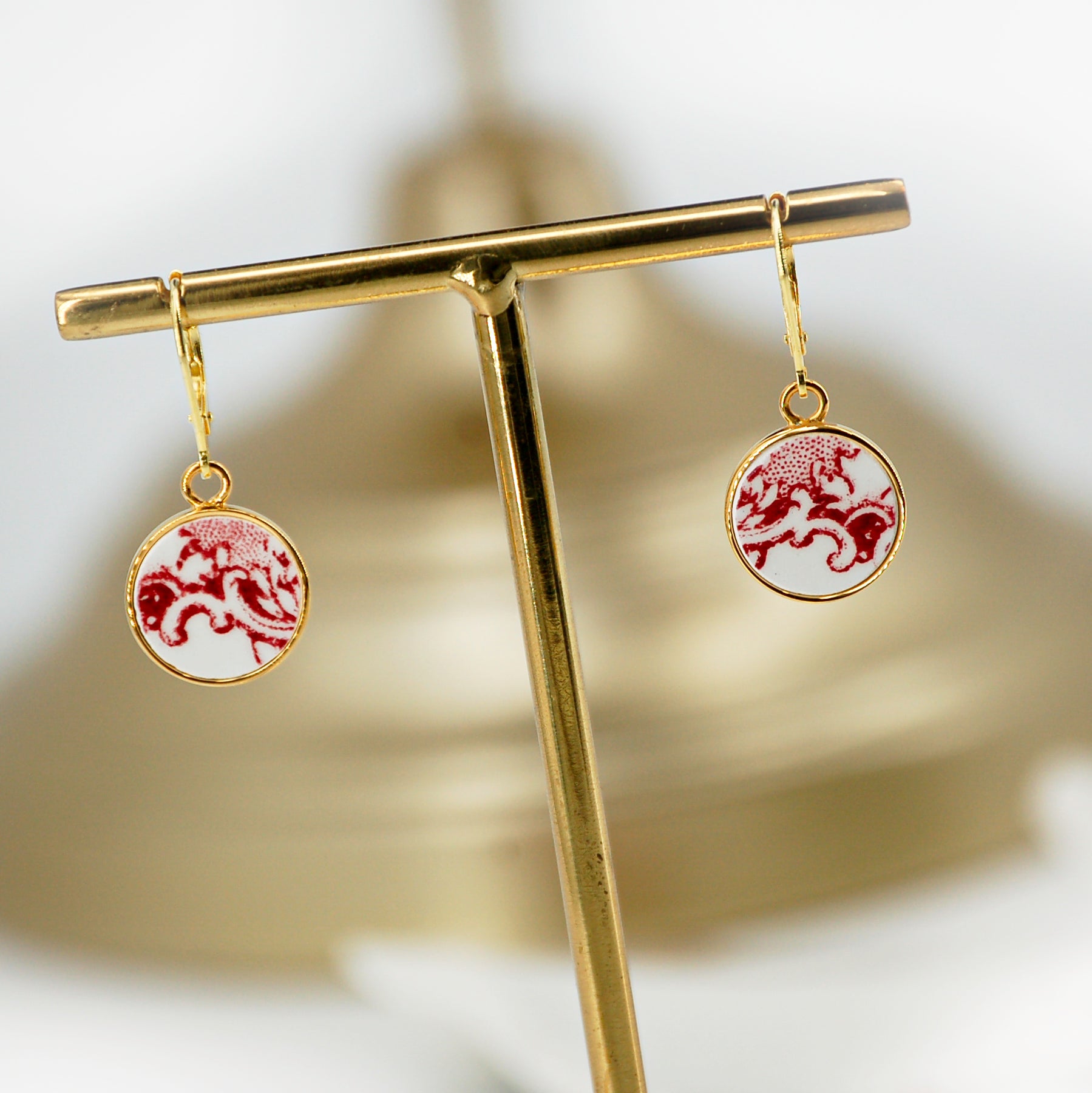 Boucles d'oreilles "Volutes en vieux rose", finition or