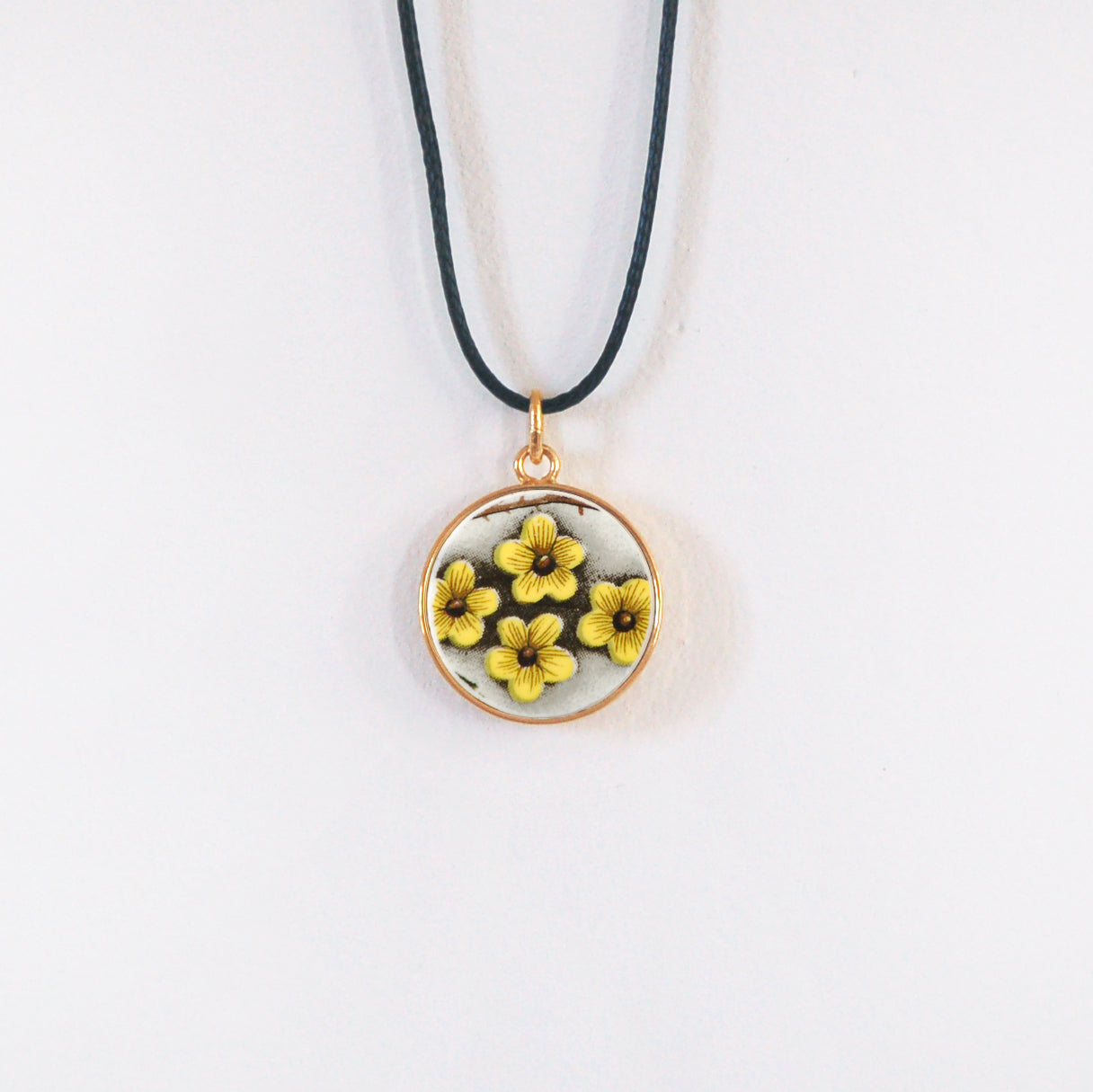Pendentif "Fleurs jaunes", finition or