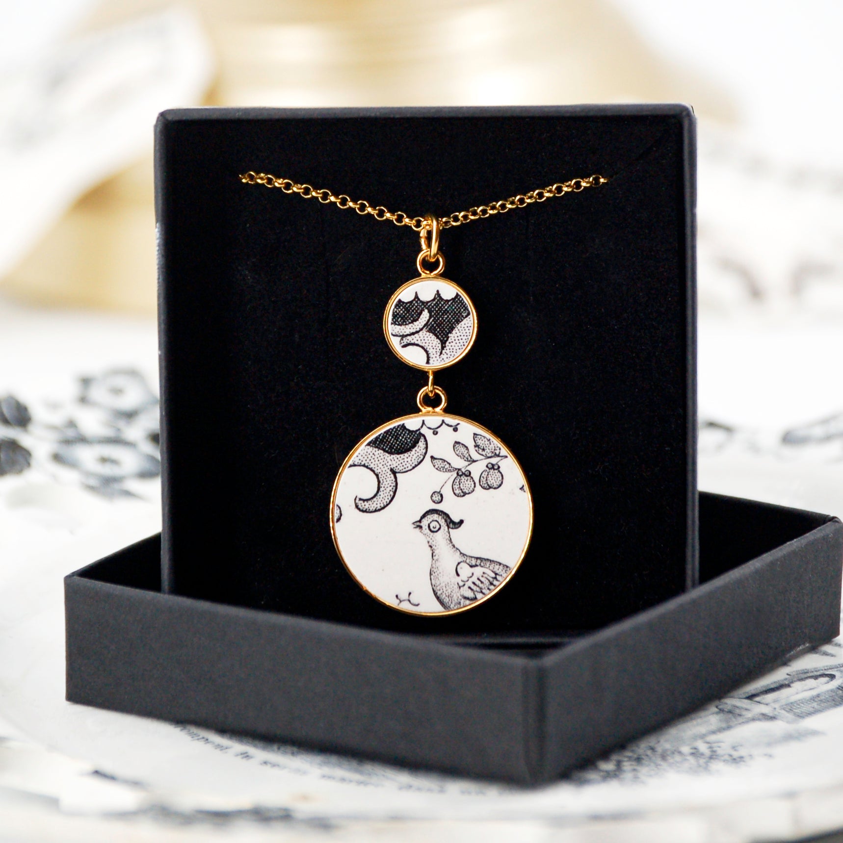 "Bird of Paradise" pendant, gold finish