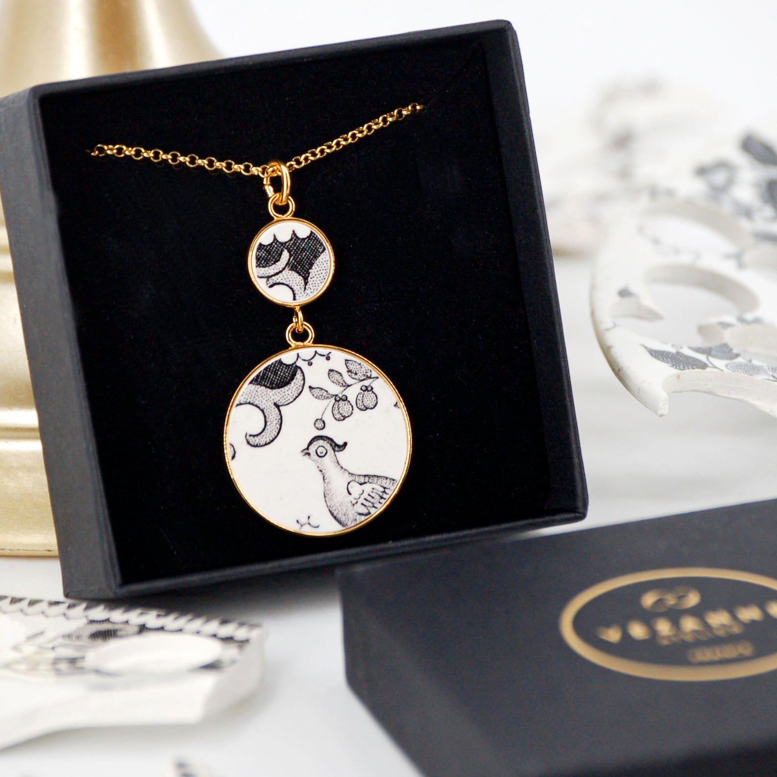 "Bird of Paradise" pendant, gold finish