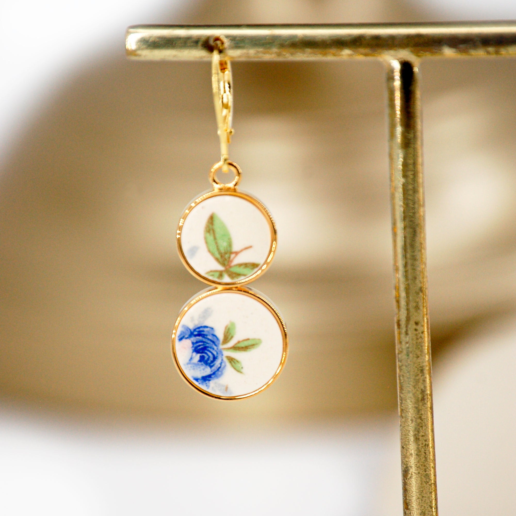 "Small blue flowers and foliage" earrings, gold finish