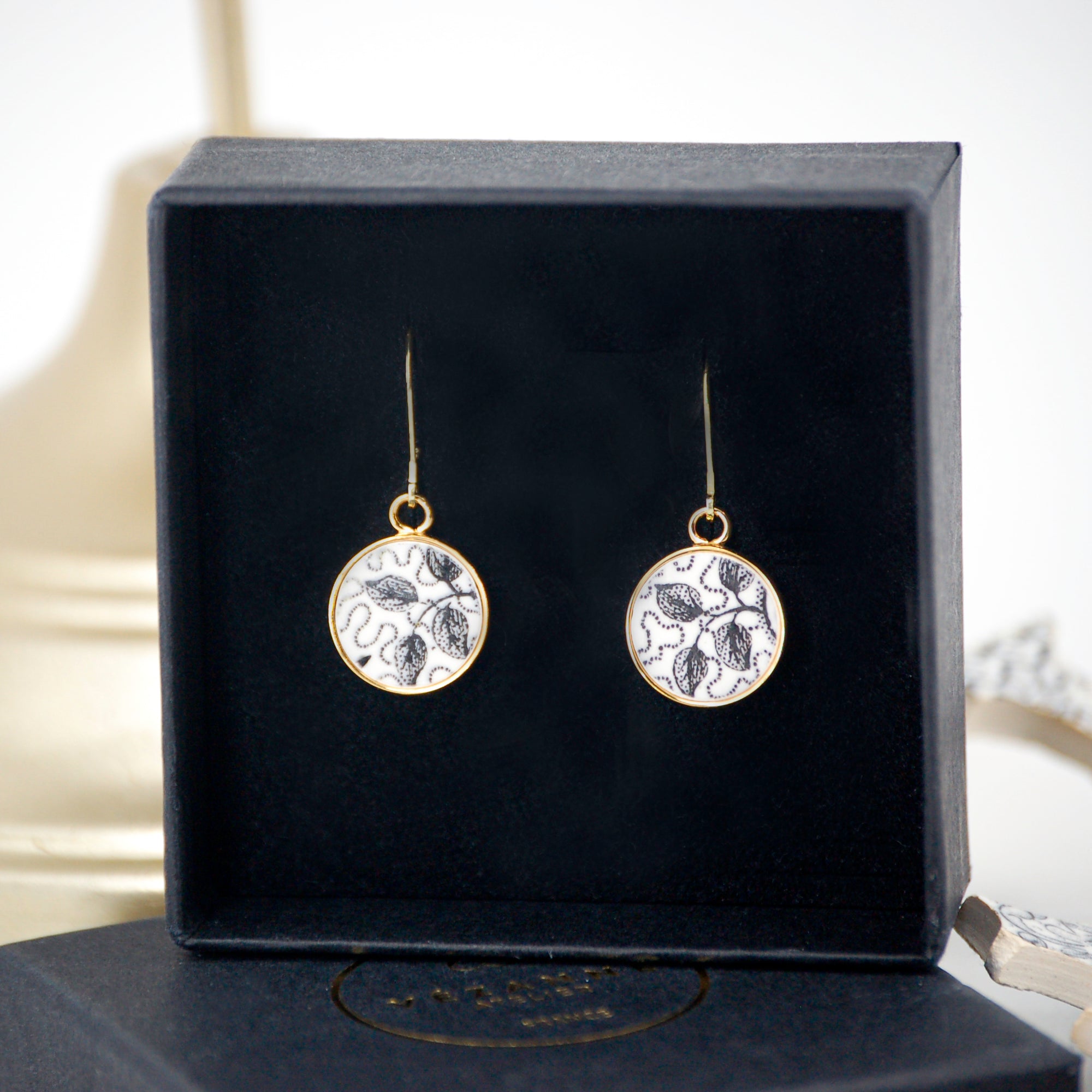 Earrings "Composition between realism and abstraction", gold finish