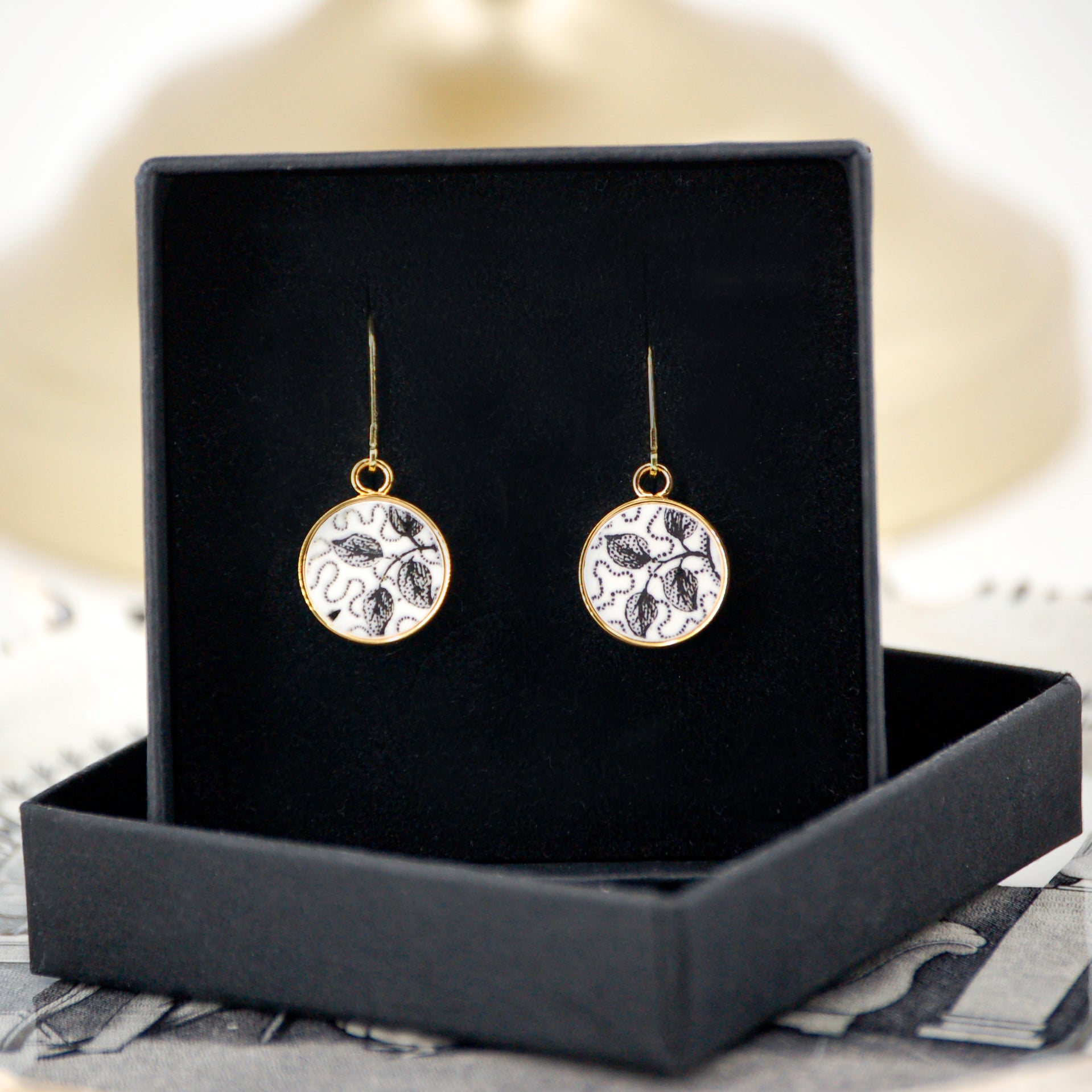 Earrings "Composition between realism and abstraction", gold finish