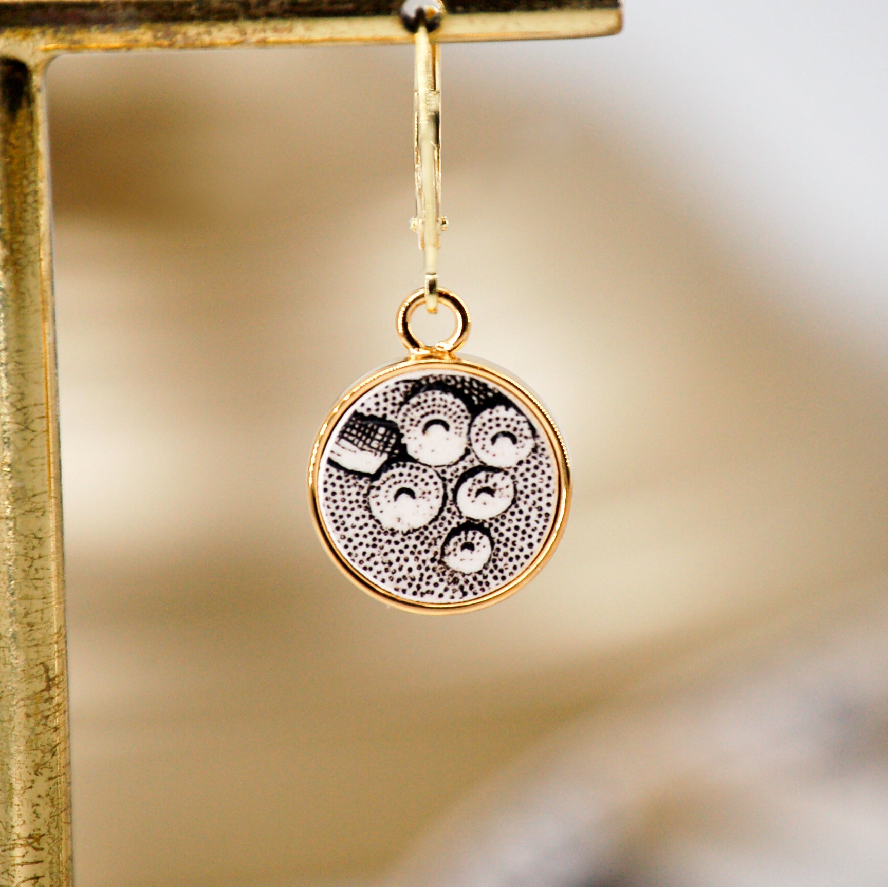 Earrings "Composition between realism and abstraction", gold finish