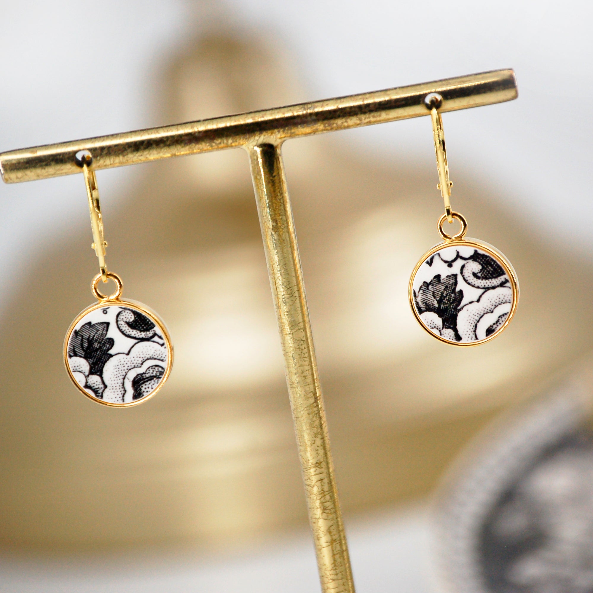 "19th Century Composition" earrings, gold finish