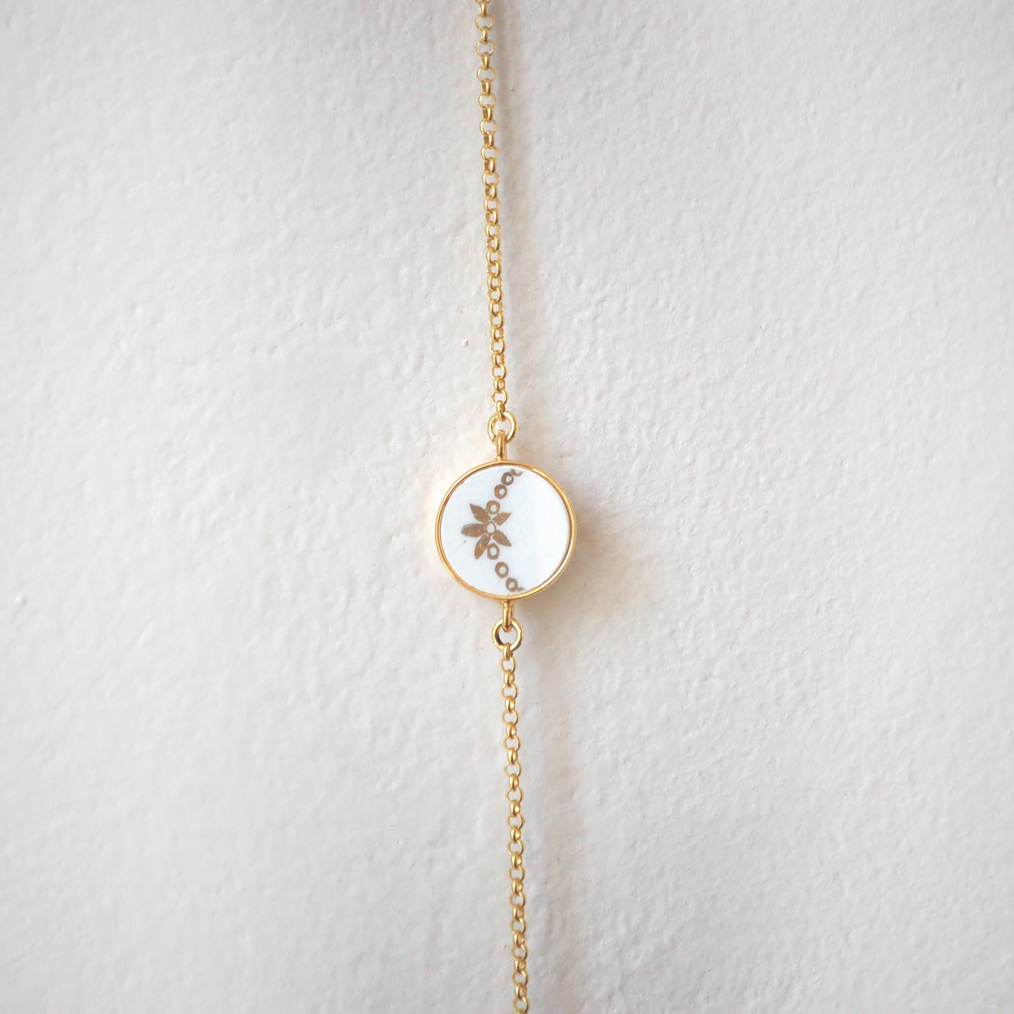 Adjustable bracelet "Small golden flower on chain", gold finish