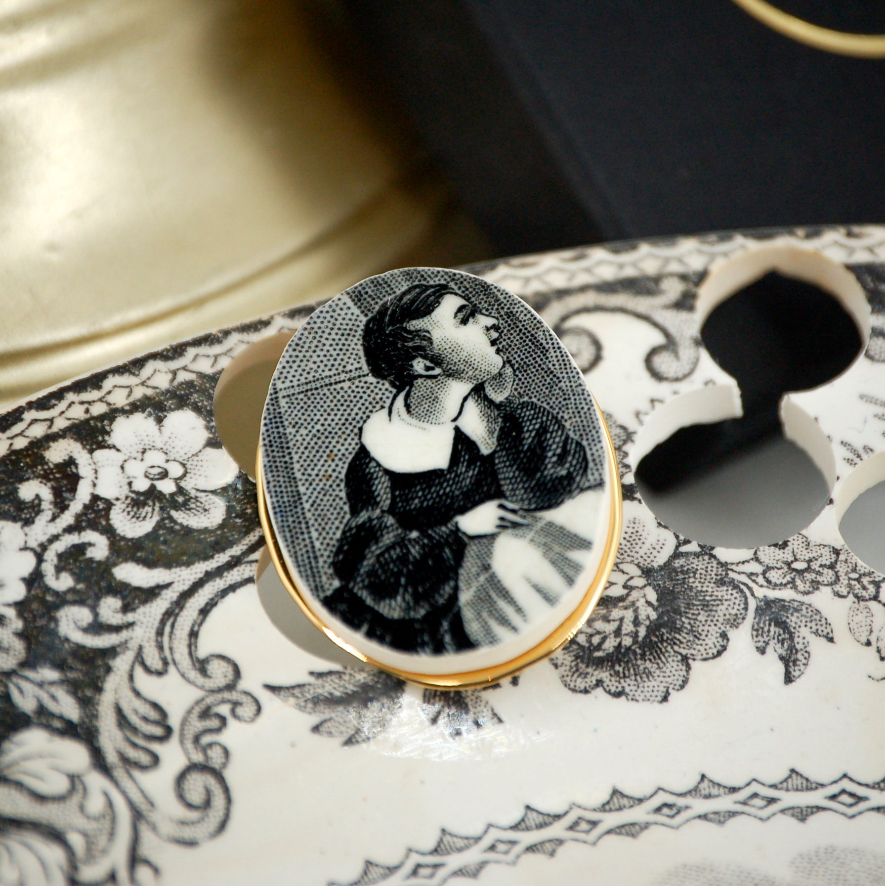 "Portrait of a Young Boy" brooch, gold finish