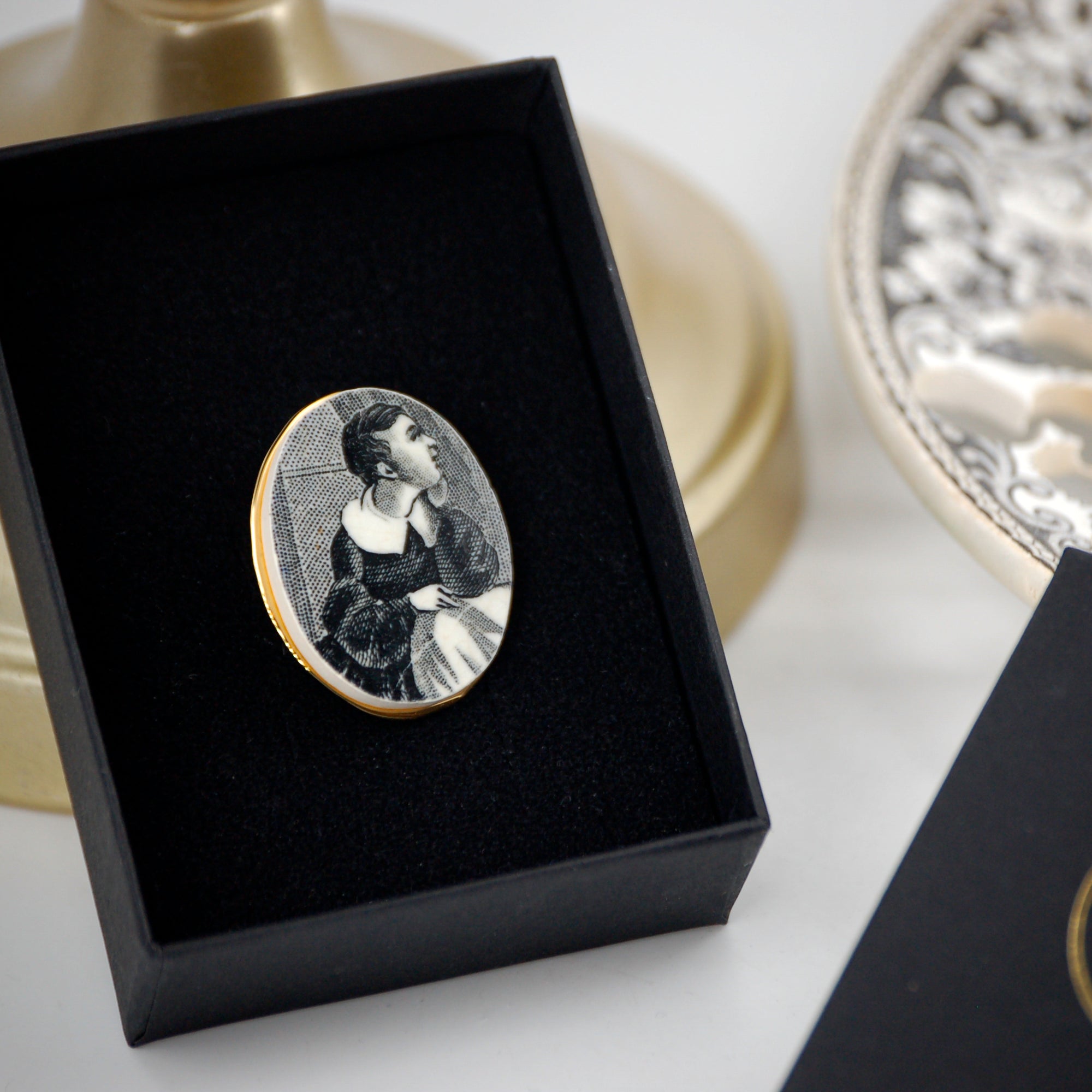 "Portrait of a Young Boy" brooch, gold finish