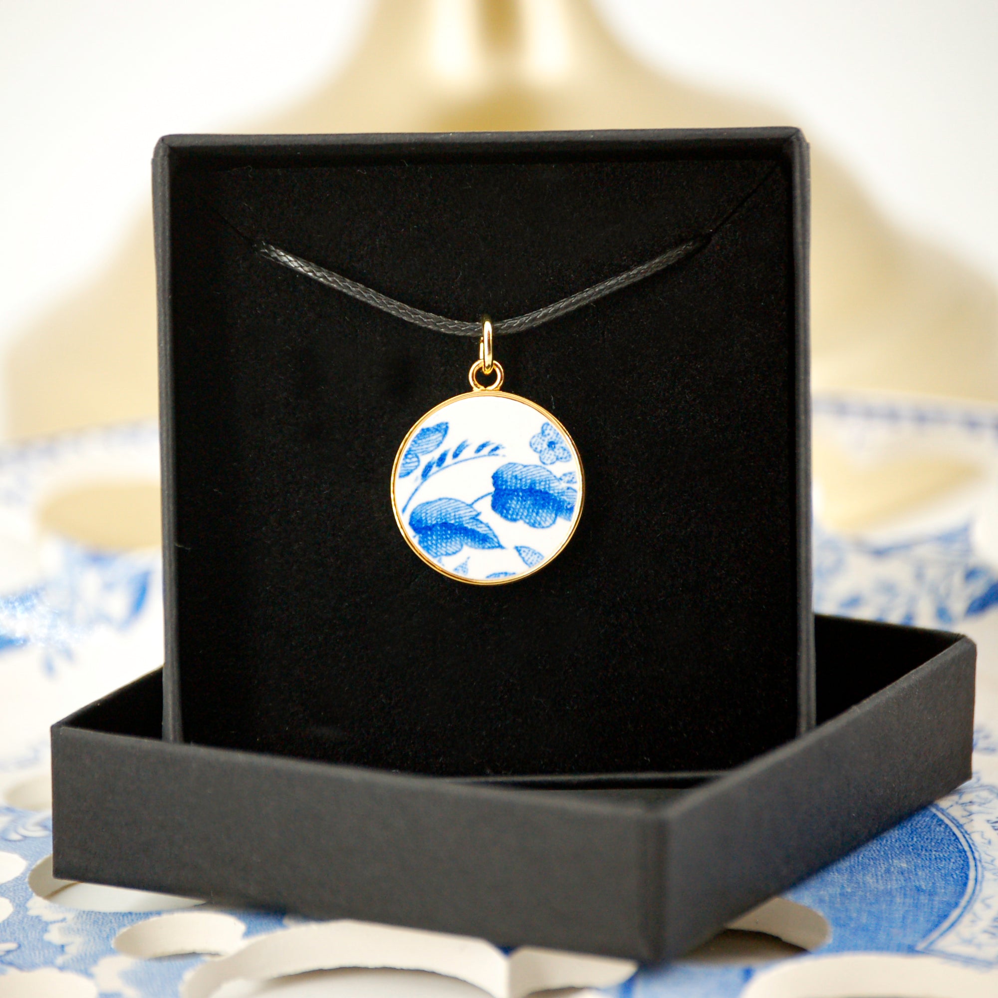 "Blue Foliage" pendant, gold finish
