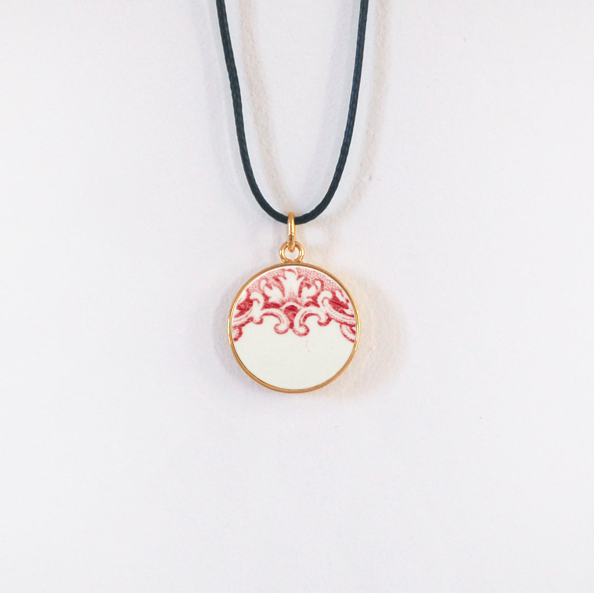 Pendentif "Volute rose poudré", finition or