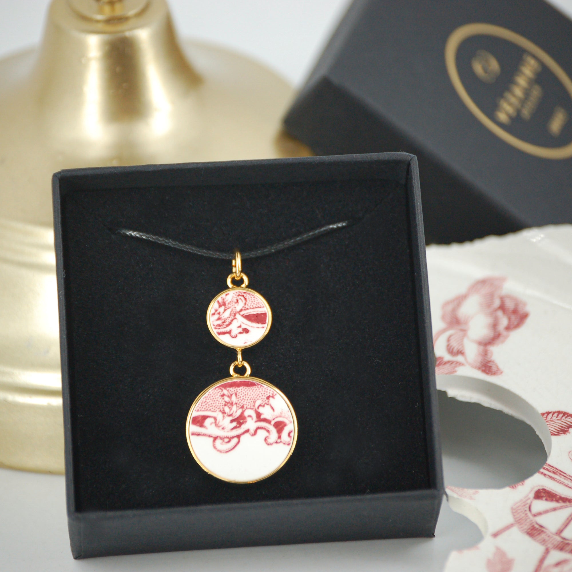 "Swirls in old rose" pendant, gold finish