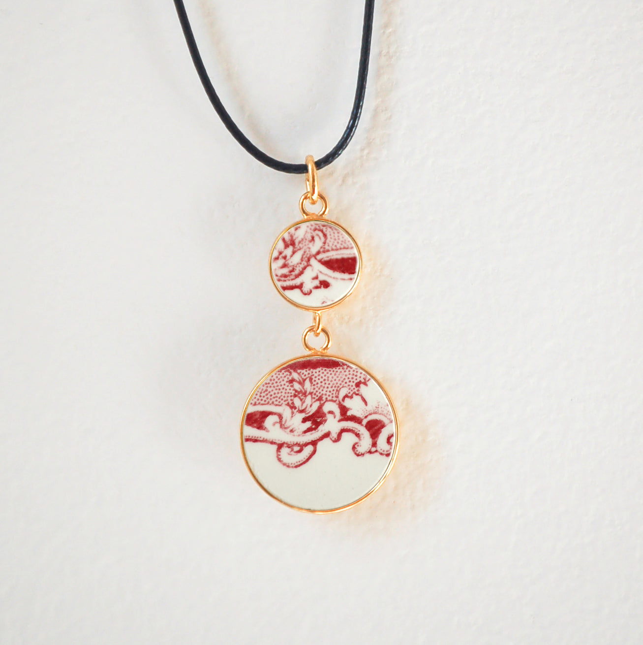 "Swirls in old rose" pendant, gold finish