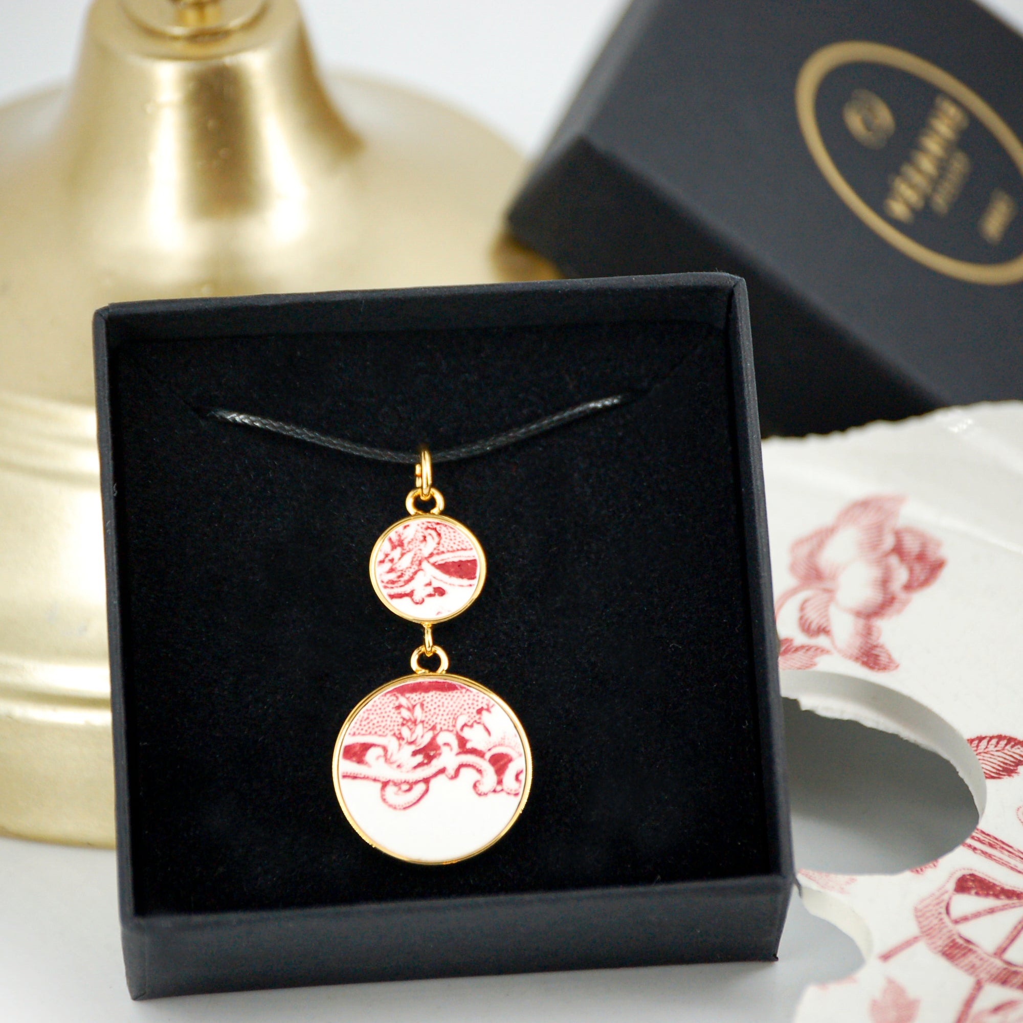 "Swirls in old rose" pendant, gold finish
