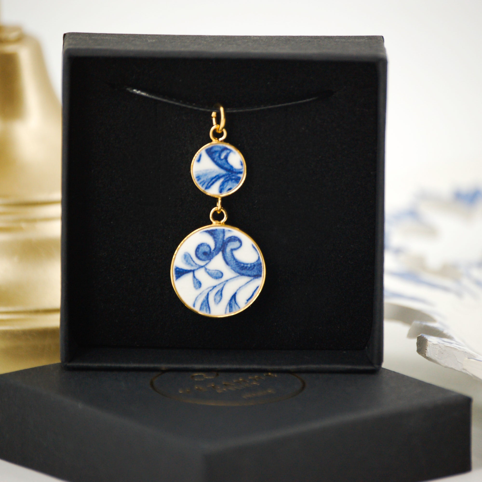 "Leaves and Scrolls" pendant, gold finish