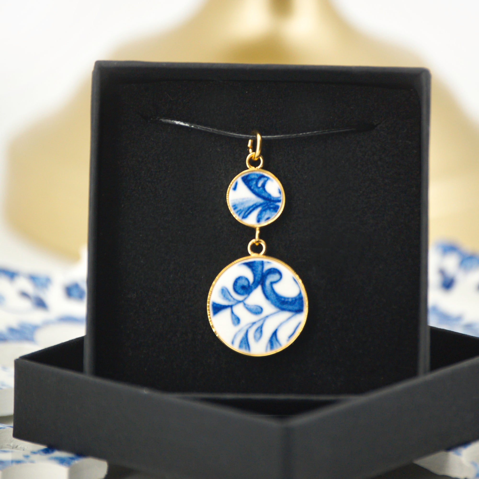 "Leaves and Scrolls" pendant, gold finish
