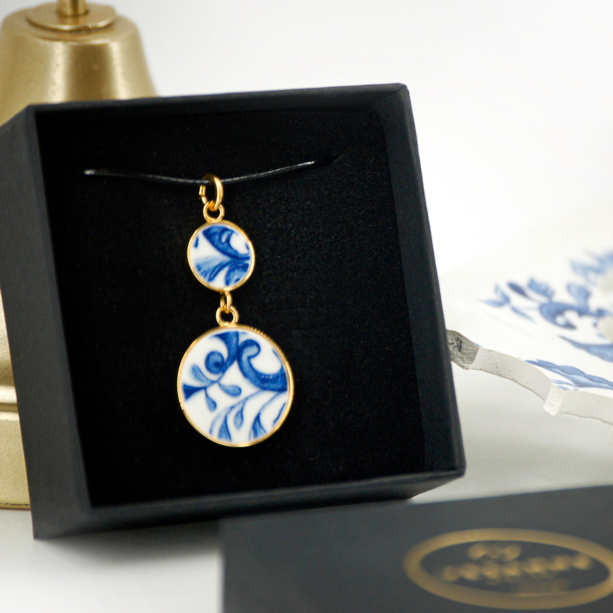 "Leaves and Scrolls" pendant, gold finish
