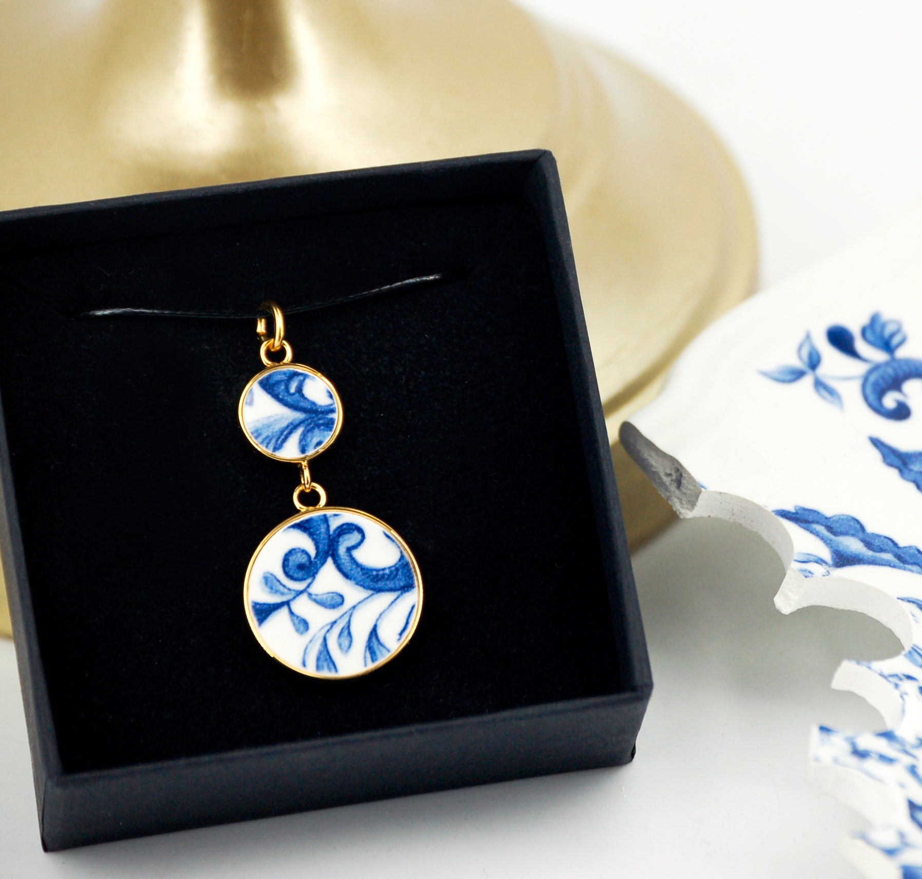 "Leaves and Scrolls" pendant, gold finish