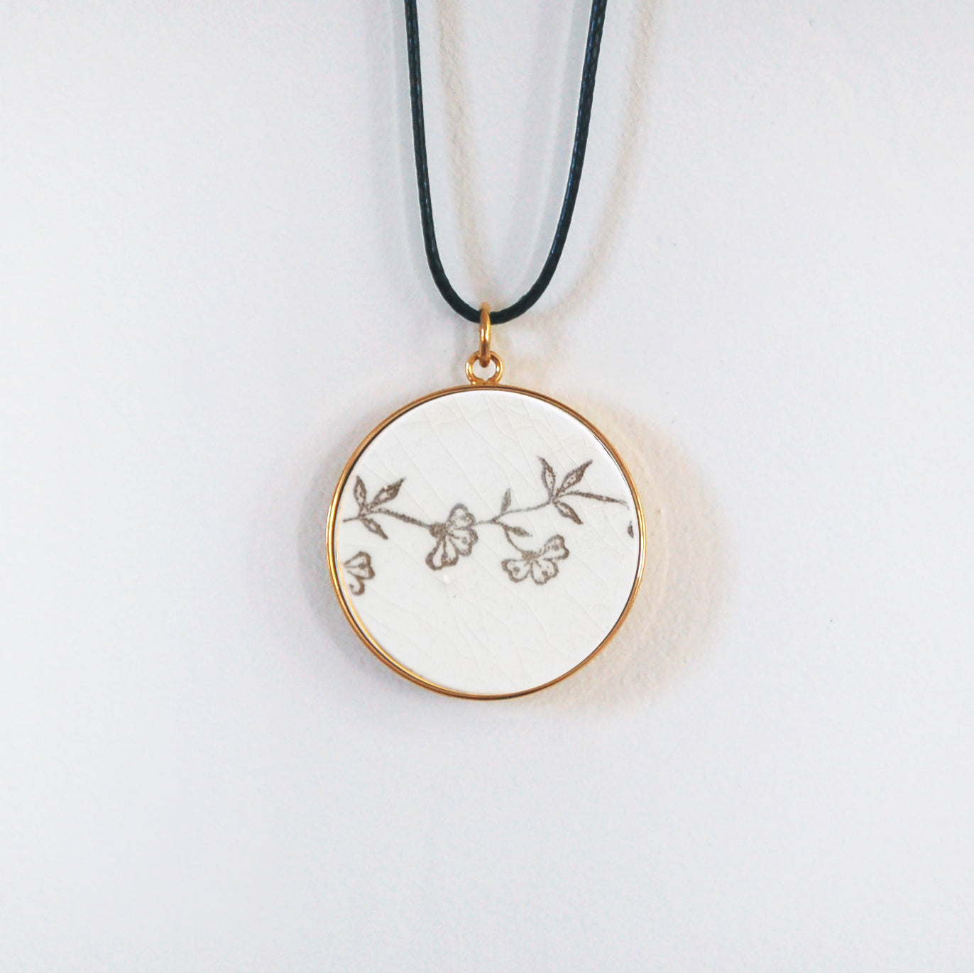 Pendentif "Les petites fleurs et feuilles", finition or