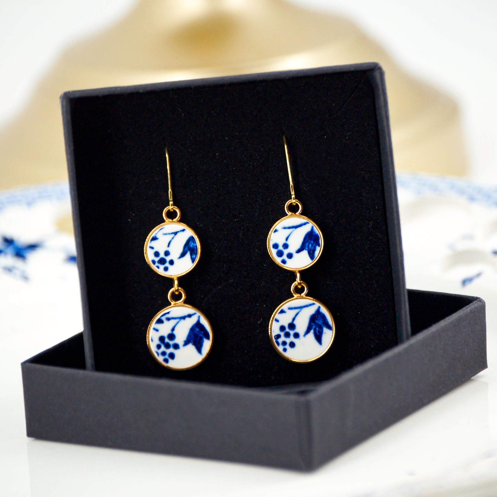 Boucles d'oreilles "fleurs bleues", finition or