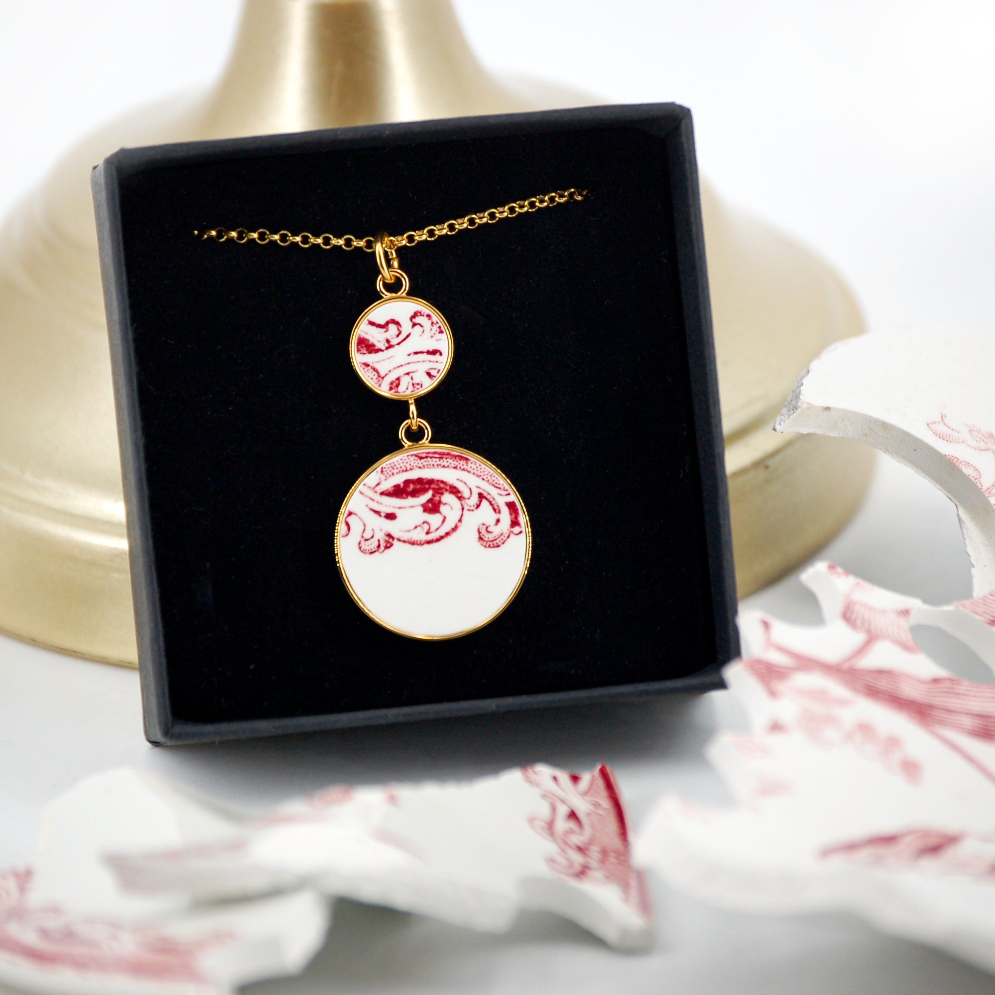 Pendant "Swirls in old rose", gold finish.